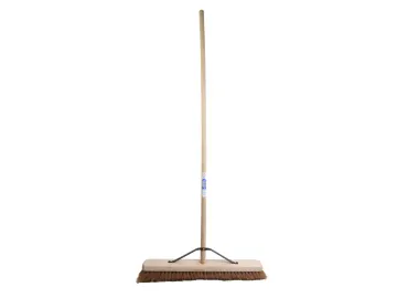 The Faithfull Broom Soft Coco 900mm (36in) + Handle & Stay, featuring brown bristles and a long wooden handle, stands upright against a white background.