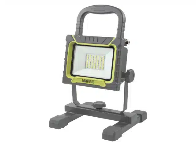 A portable grey and yellow LED work light with a handle and adjustable stand, designed for use in construction or DIY projects.