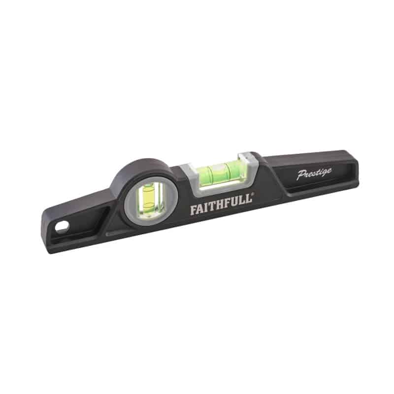 A black Faithfull Prestige spirit level with two bubble vials, used for checking horizontal and vertical alignment in construction or DIY tasks.