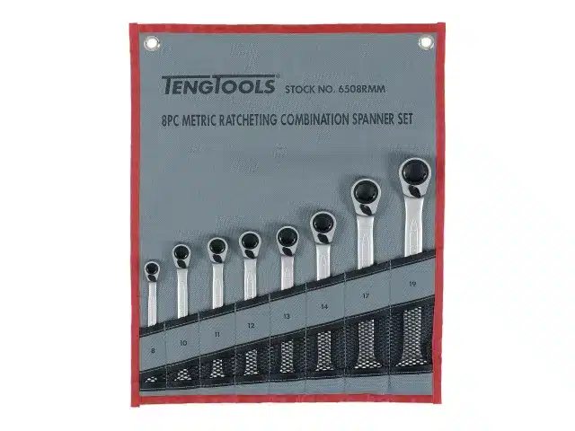 A set of eight metric ratcheting combination spanners stored in a grey fabric roll-up pouch.