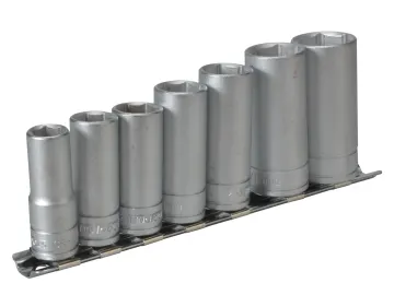 A set of seven graduated metal socket spanner attachments on a rail.